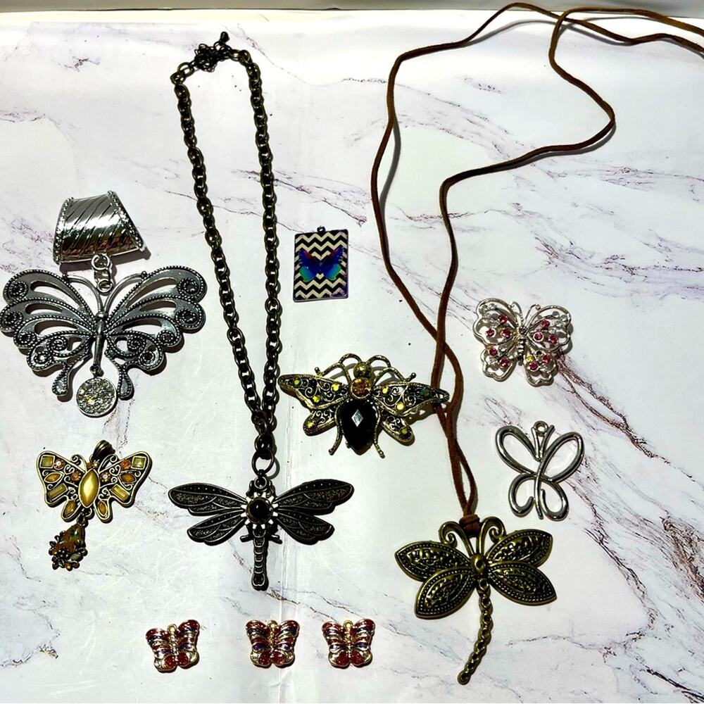 Bundle of butterfly and firefly necklaces and pendants